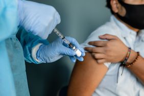 A close up shot of a vaccination procedure.