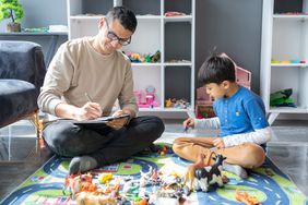young boy with adhd receiving treatment from therapist 
