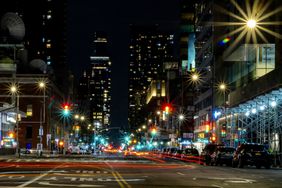 street with blurry lights caused by astigmatism 
