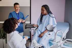 person getting a cervical biopsy at a gynecologist's office