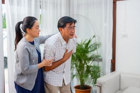 older person experiencing chest pain