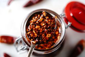 Homemade Asian chilli oil in a glass jar, 