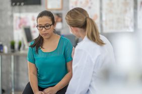 woman with depression talking to doctor 
