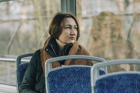 person in train having dissociative episode 