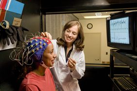 doctor conducting eeg on patient