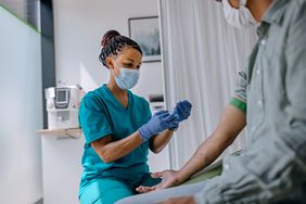 healthcare provider taking eosinophils blood test