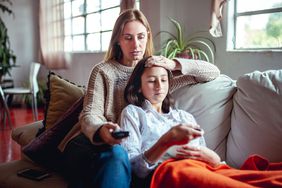 mother and daughter at home sick