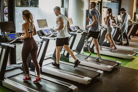 people running on treadmill 