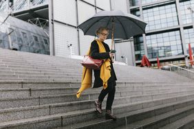 Woman walking in the rain