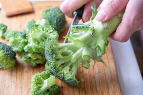 Fresh green broccoli on a wooden cutting board