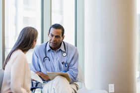 Doctor talking to patient