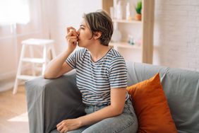 Woman using an inhaler