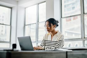 Woman working at her desk