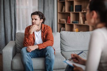 Young man talking to a therapist
