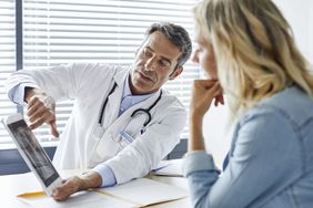 Doctor talking to patient
