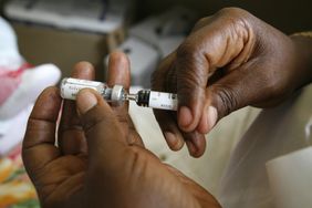 Man Preparing Vaccine