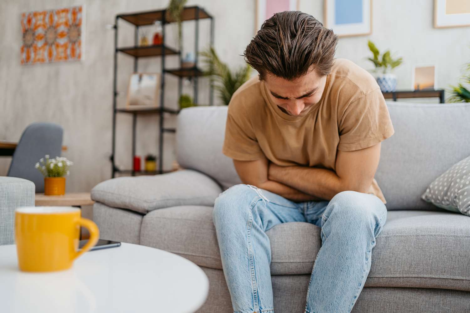 person with giardia infection having stomach pain and gas