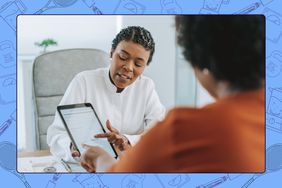 Doctor explaining to a patient using an ipad