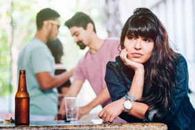 Woman looking bored