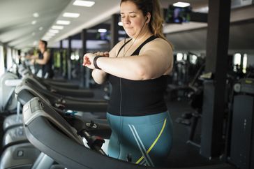 woman on treadmill at the gym
