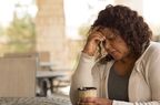 African American middle age woman looking sad