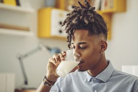 man drinking milk