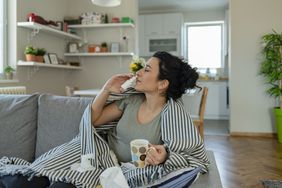 a person using nasal spray