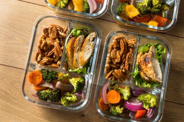 homemade chicken and vegetable meal prep in glass container