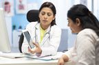 Vaginal yeast infection - Doctor talking to patient
