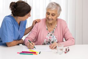Person drawing in an art therapy session