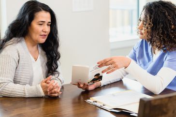 Nurse discussing healthcare options with patient