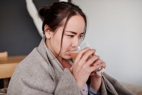 Person with cold drinks beverage.