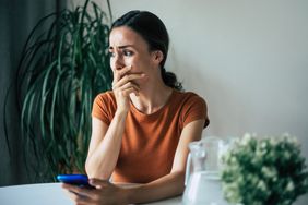 sad and anxious person living with thanatophobia