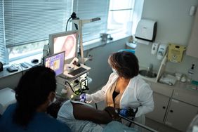 Endoscopy - Doctor examining patient with endoscope