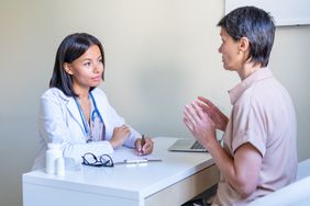 Person talking to gynecologist