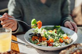 woman eating a plant-based lunch