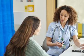 Doctor explaining gut health test to patient