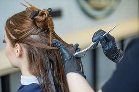 a woman gettng her hair dyed
