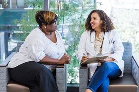 Person talking to gynecologist about perimenopause
