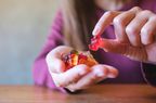 Closeup of person holding gummy bears.