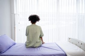 black female patient hospital bed