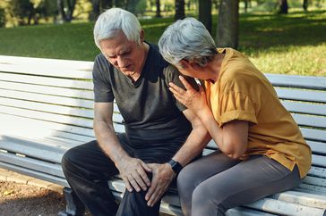 Older couple sitting on bench