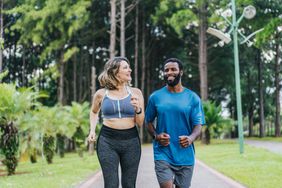 Friends exercising in a park