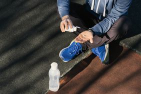 An athlete takes supplements