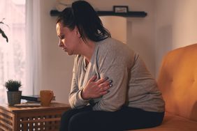 person who missed an ozempic dose experiencing abdominal pain