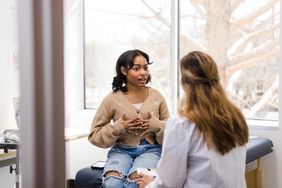 Person talking to gynecologist about chemical pregnancy