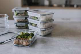 Stack of tupperware with lunches inside. 