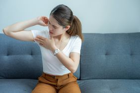 person with swollen lymph nodes in their armpit
