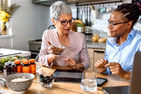 Nutritionist (dietitian) working on a meal plan with a client