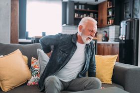 person with lung cancer experiencing back pain